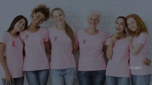 row of women dressed in pink