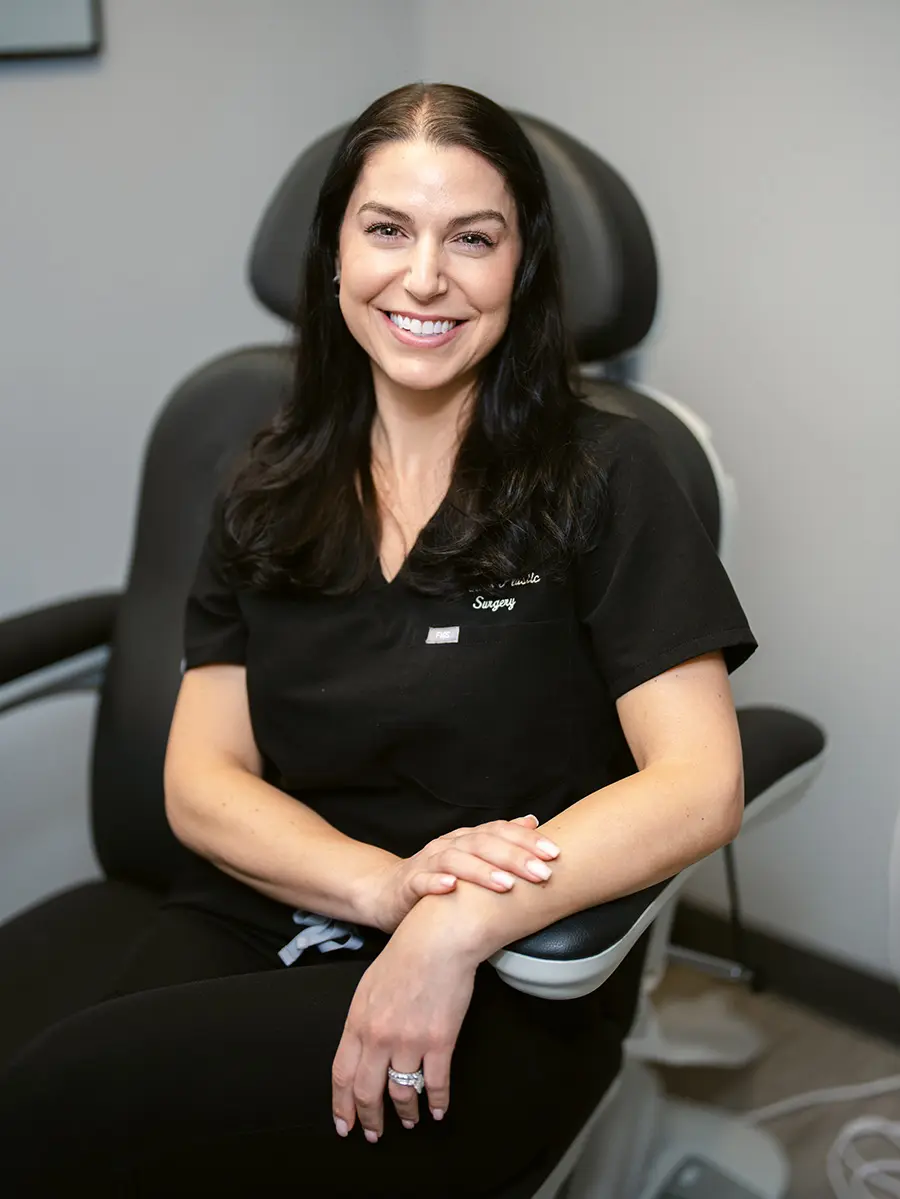 Nichole sitting in a chair