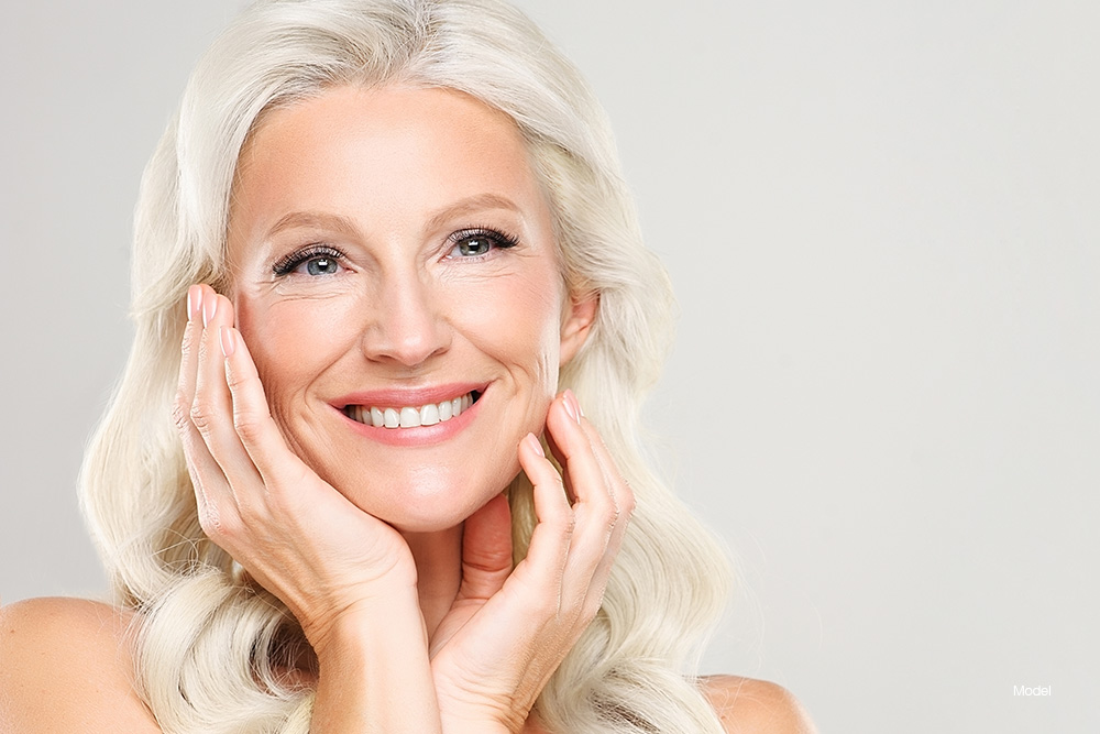 Mature woman with blonde hair smiling